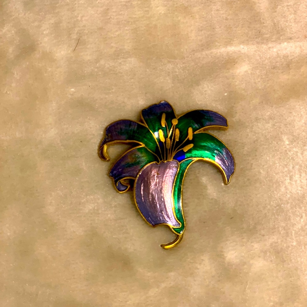Old and vibrant lily brooch